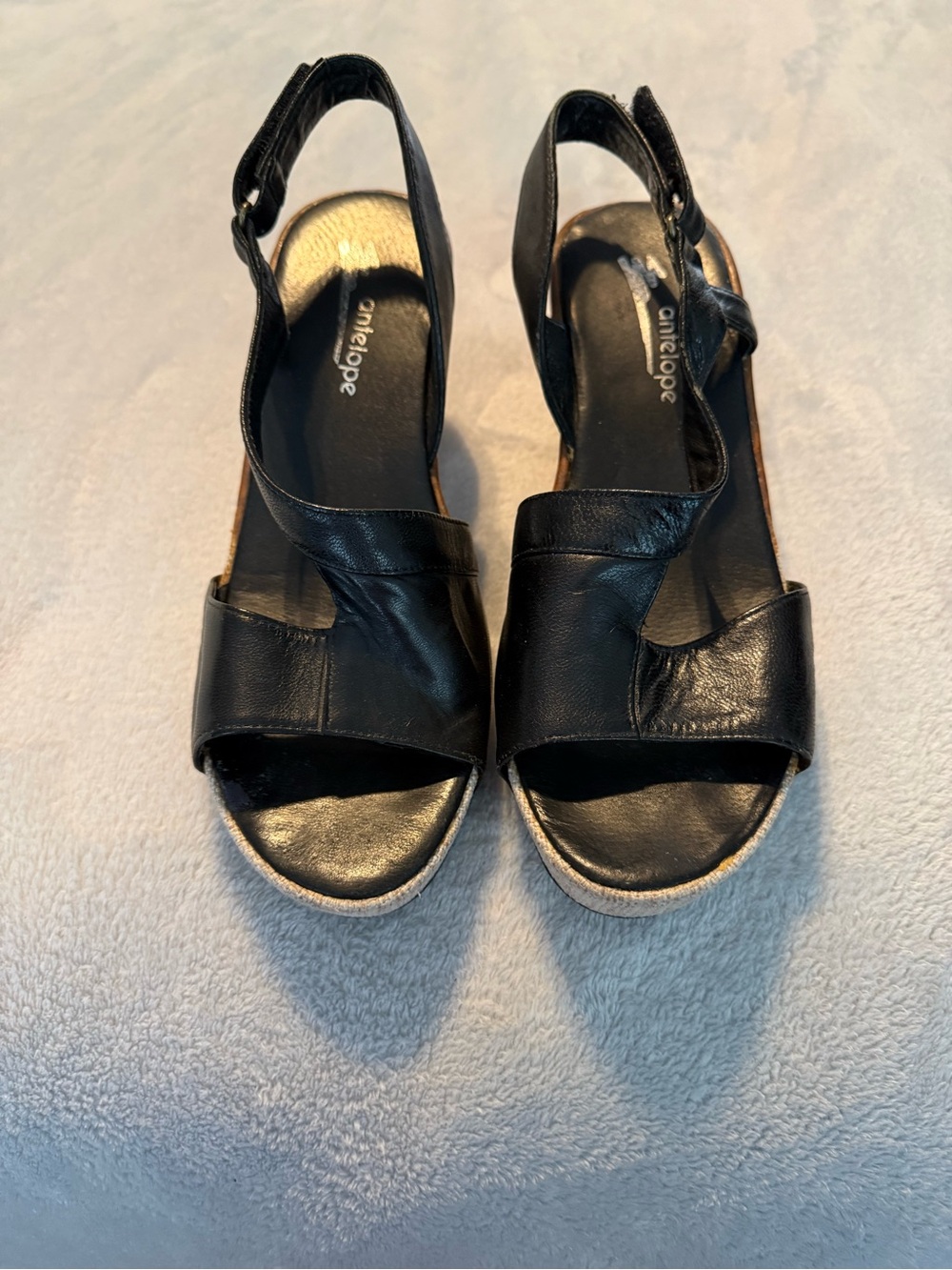 Antelope Black Leather Wedge Slingback Sandals